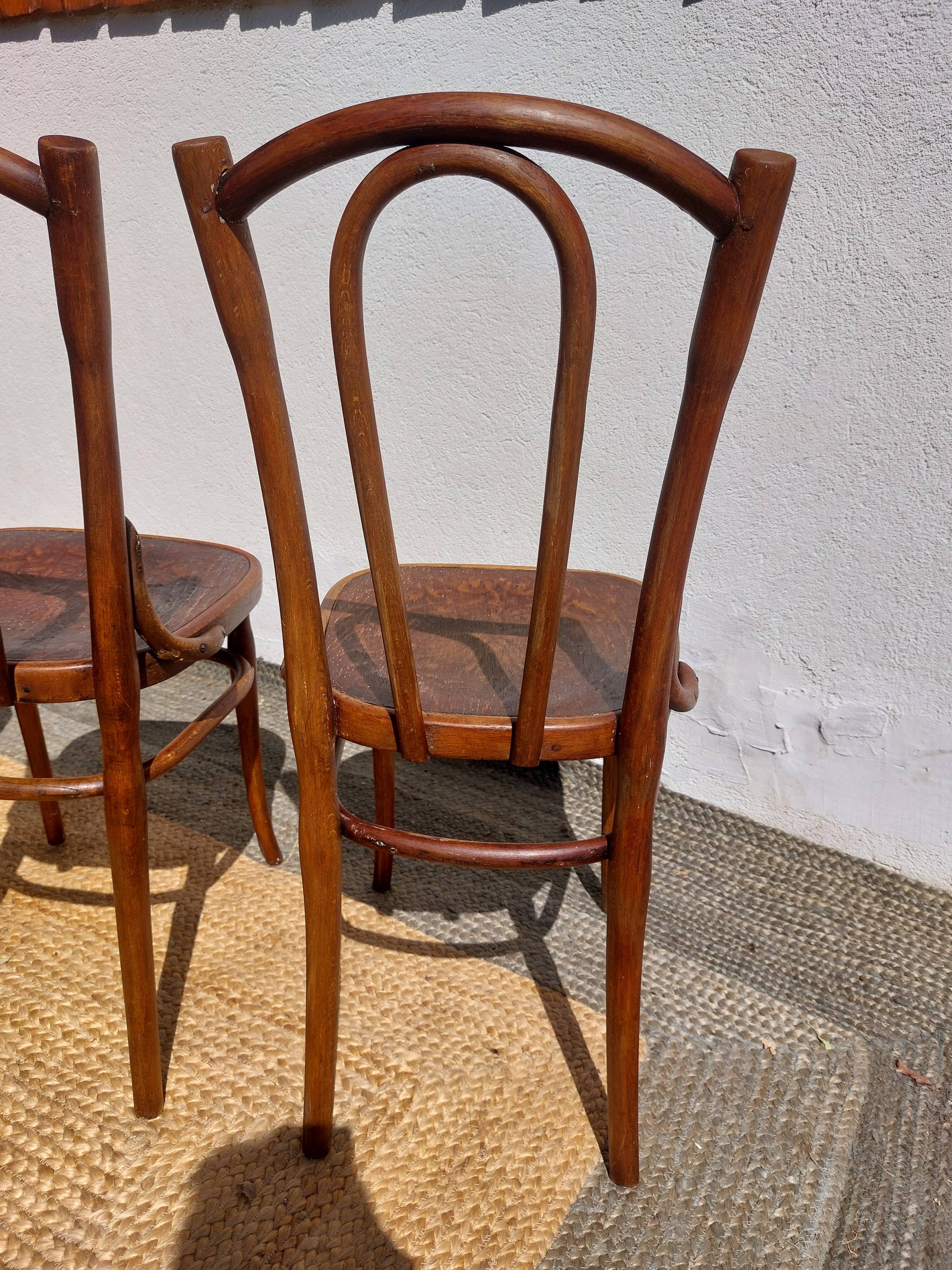 set of 3 curved wooden bistro chairs with patterns