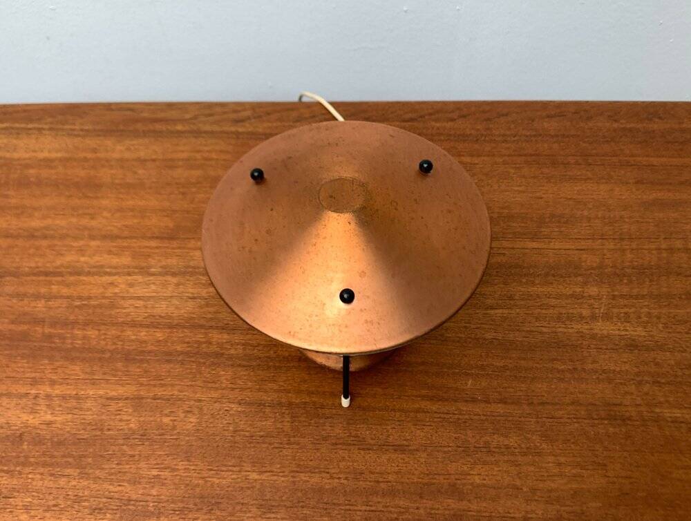 Small tripod table lamp in copper, 1950s.