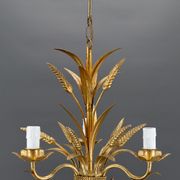 Golden suspension on ears of wheat, circa 1960