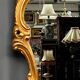 Golden mirror. Wood.