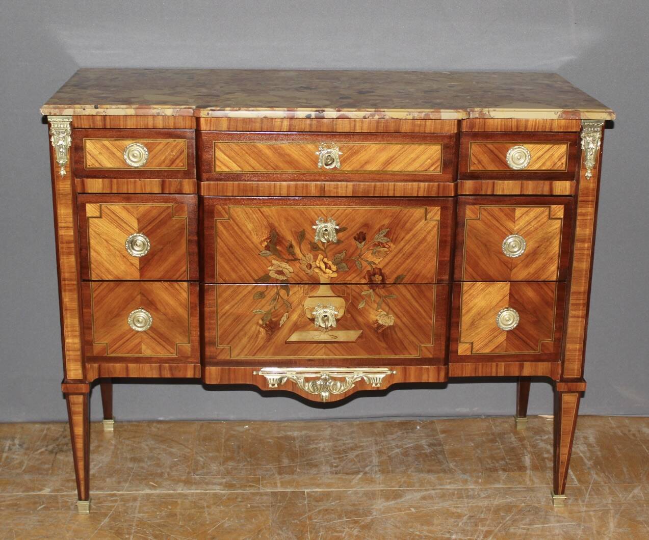 Louis XVI style commode in marquetry from around 1940.