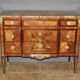 Louis XVI style commode in marquetry from around 1940.