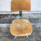 Former green metal workshop chair