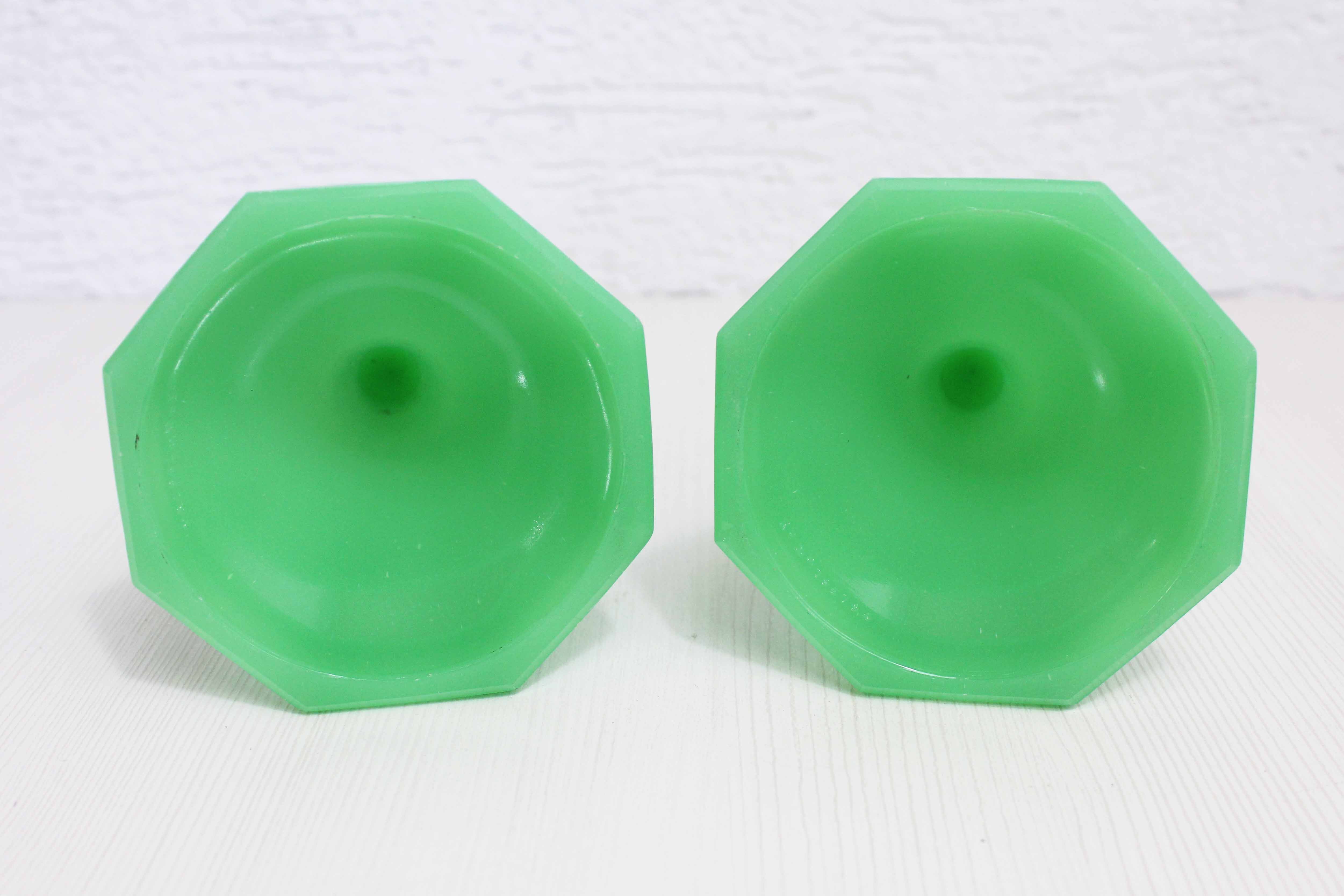 Set of two candlesticks and an Art Deco cup