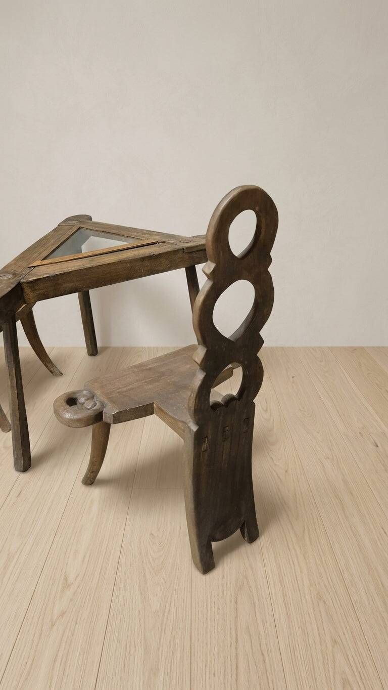 Vintage sculptural wooden table and two chairs, hand-carved loop backrests