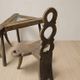 Vintage sculptural wooden table and two chairs, hand-carved loop backrests