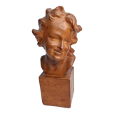 Bust of a laughing child in patinated plaster, 35 cm