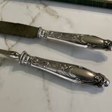 Leg cutlery set. Silver handles.