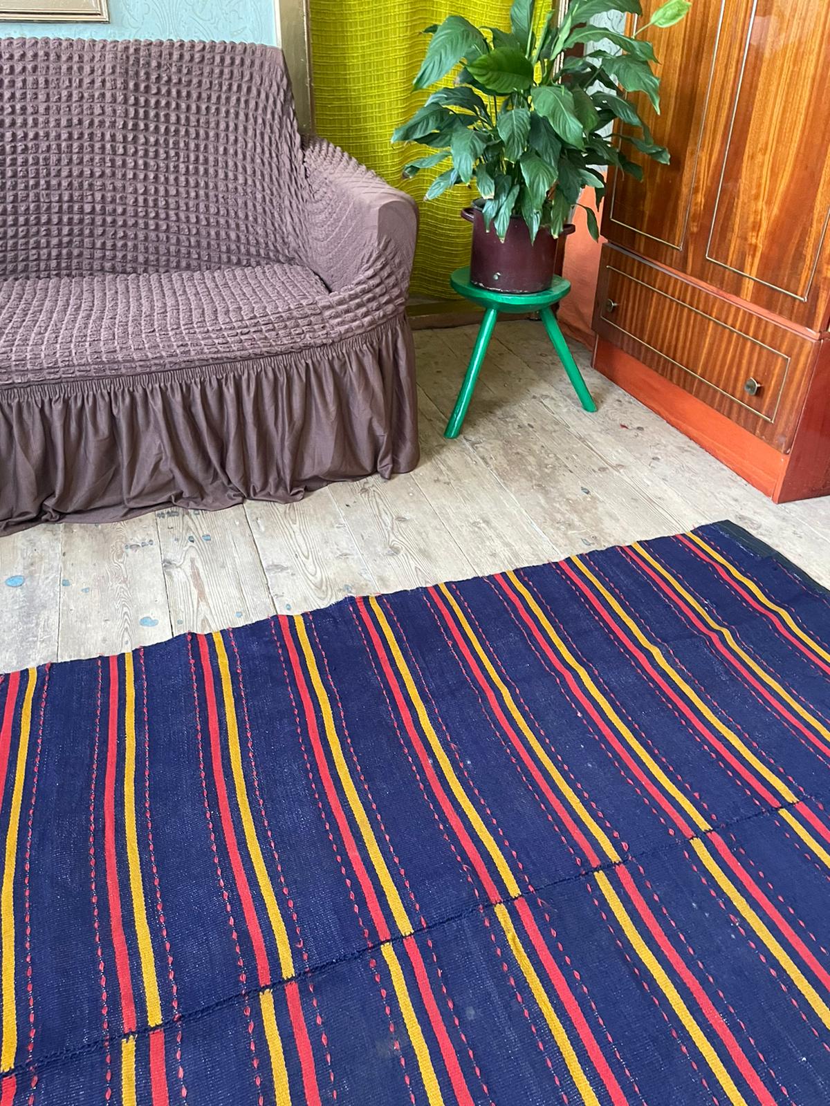 Romanian rug handwoven in wool, purple background with red and yellow stripes 183x133cm