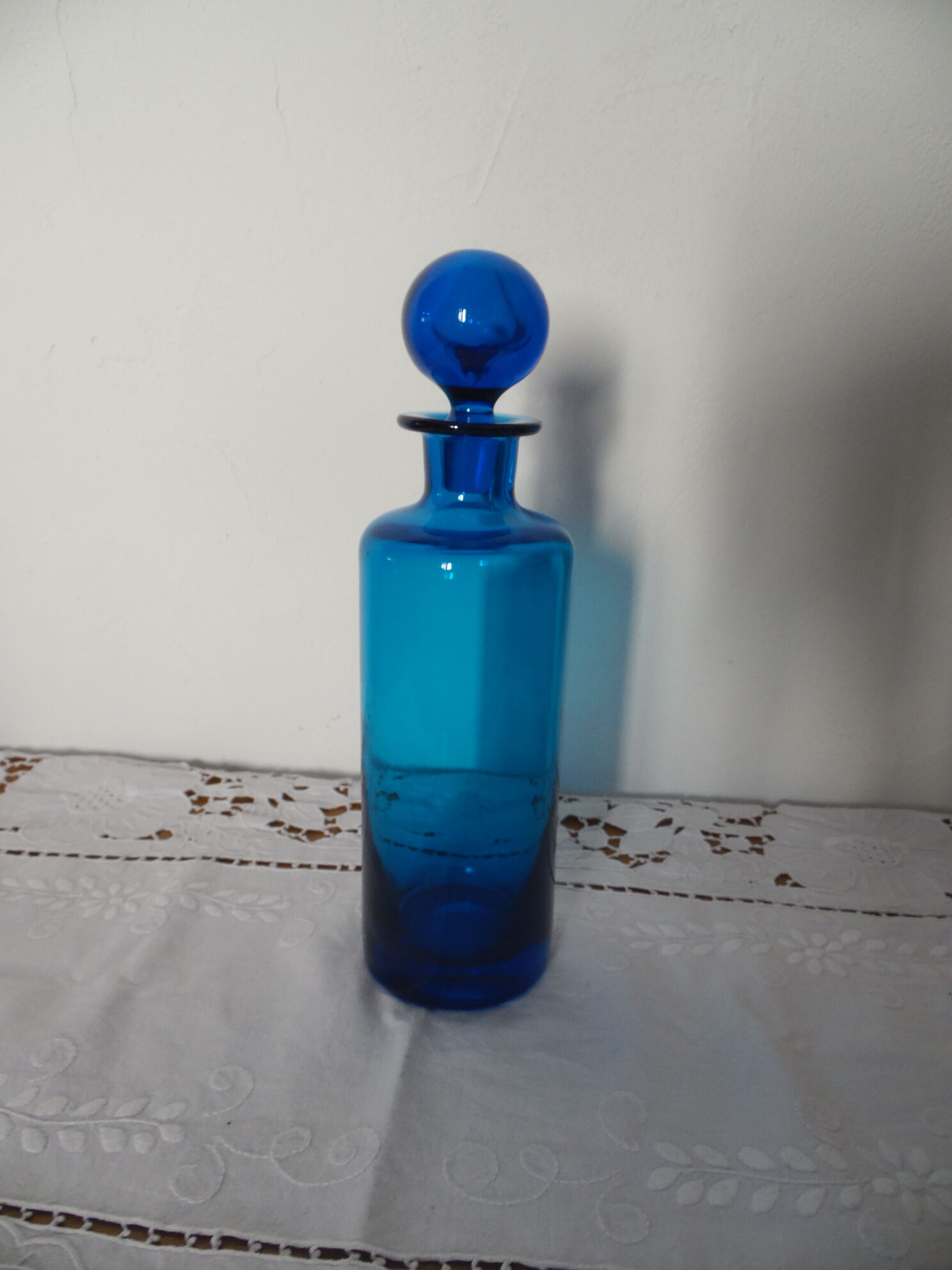 Glass bottle blue ball cap