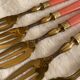 Set of 12 coral and gold dessert forks