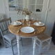 Oval table with beaded grey patinated flaps, wooden tray