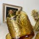 Six amber-colored stemmed glasses