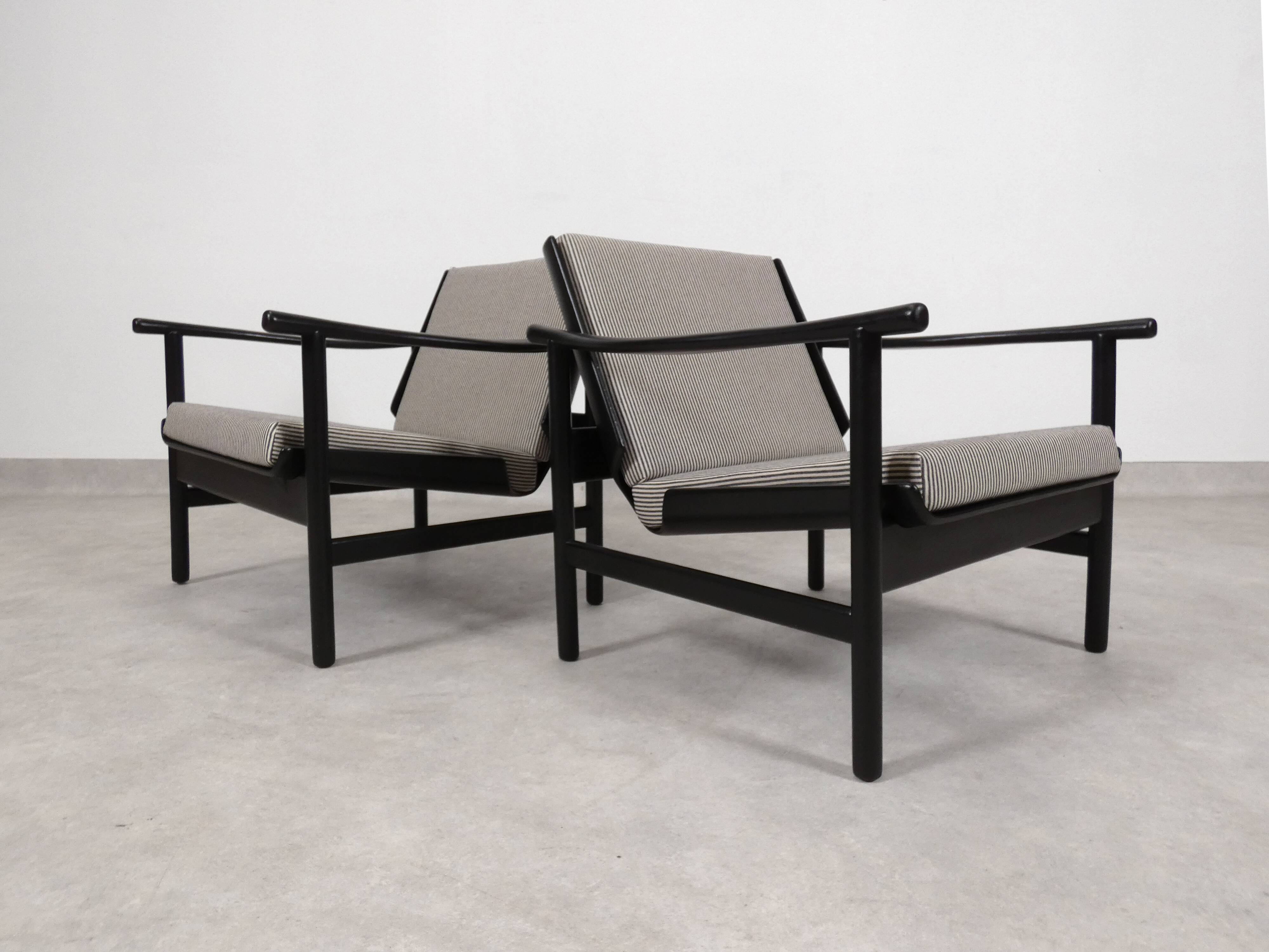 2x wooden Scandinavian arm chairs