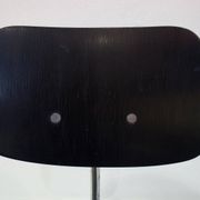Set of four Egon Eiermann model SE 68 chairs in black lacquered plywood and steel.