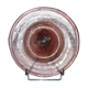 Antique plate in pink bubbled blown glass