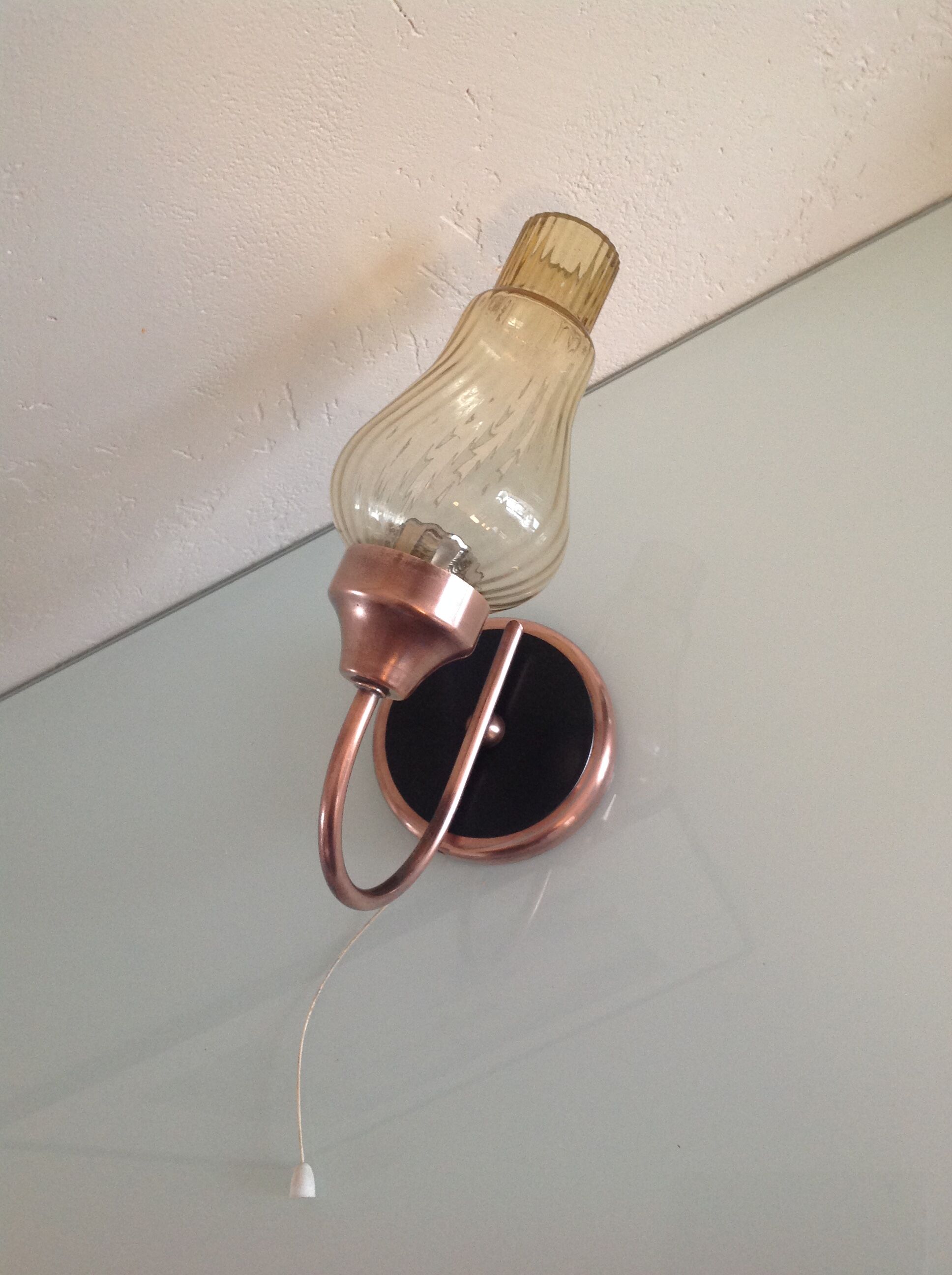 Vintage brass wall and smoked glass