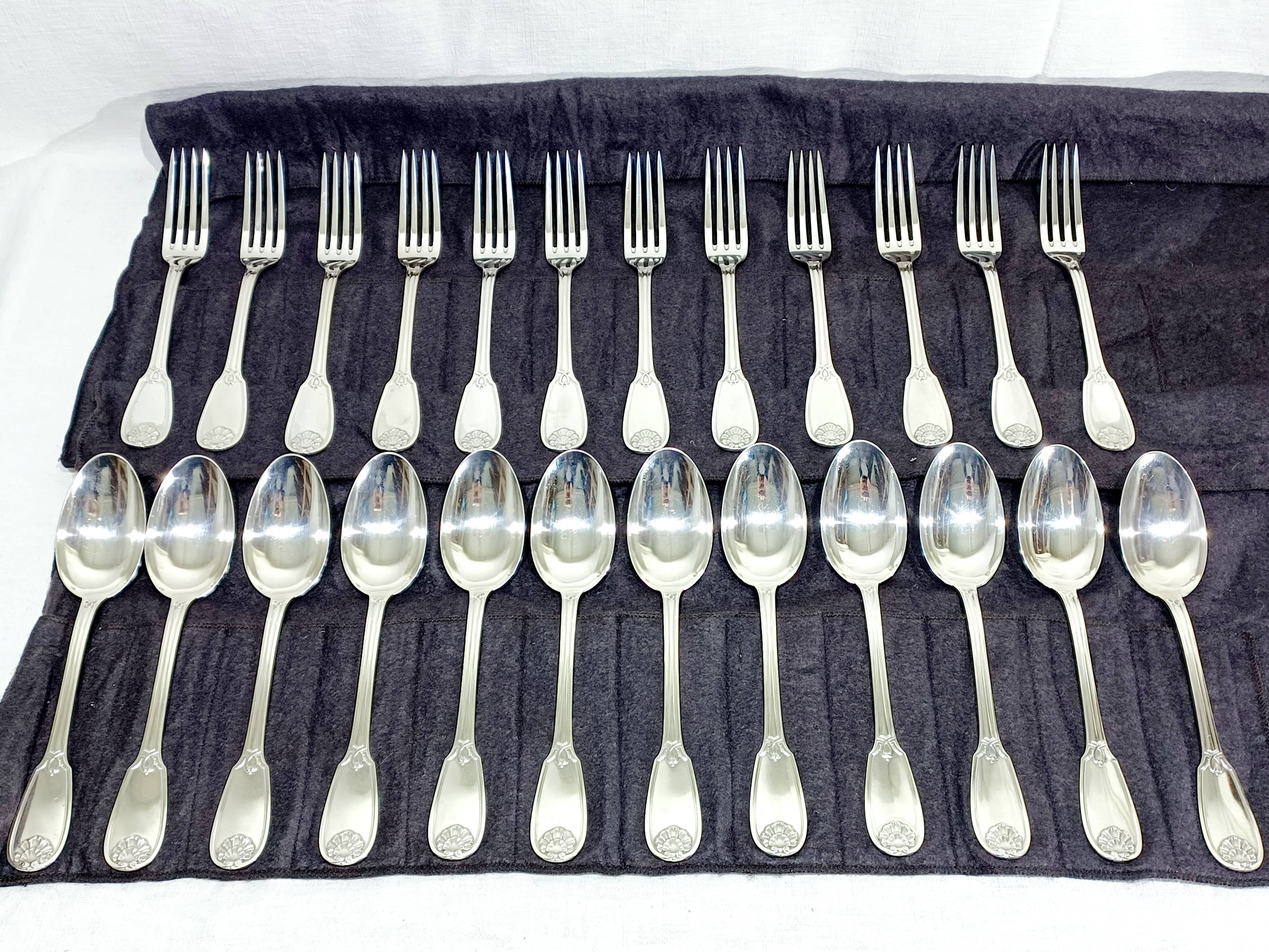 12 Louis XIV style silver cutlery sets