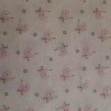 Vintage wicker cradle on wheels from the 1970s.