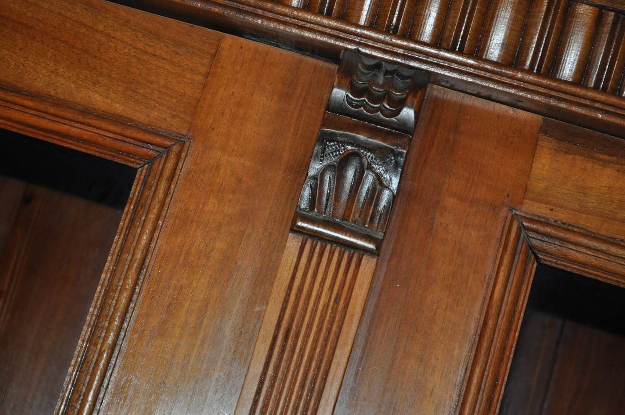 Antique wooden and glass cabinet in brown - 1900 style display case with carved mouldings.