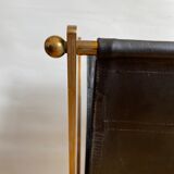 Leather and gilded brass magazine holder