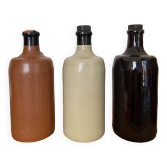 Lot of 3 Max Krüger Moschheim (MKM) bottles: in vintage German stoneware