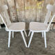 Pair of vintage white wooden bistro chairs