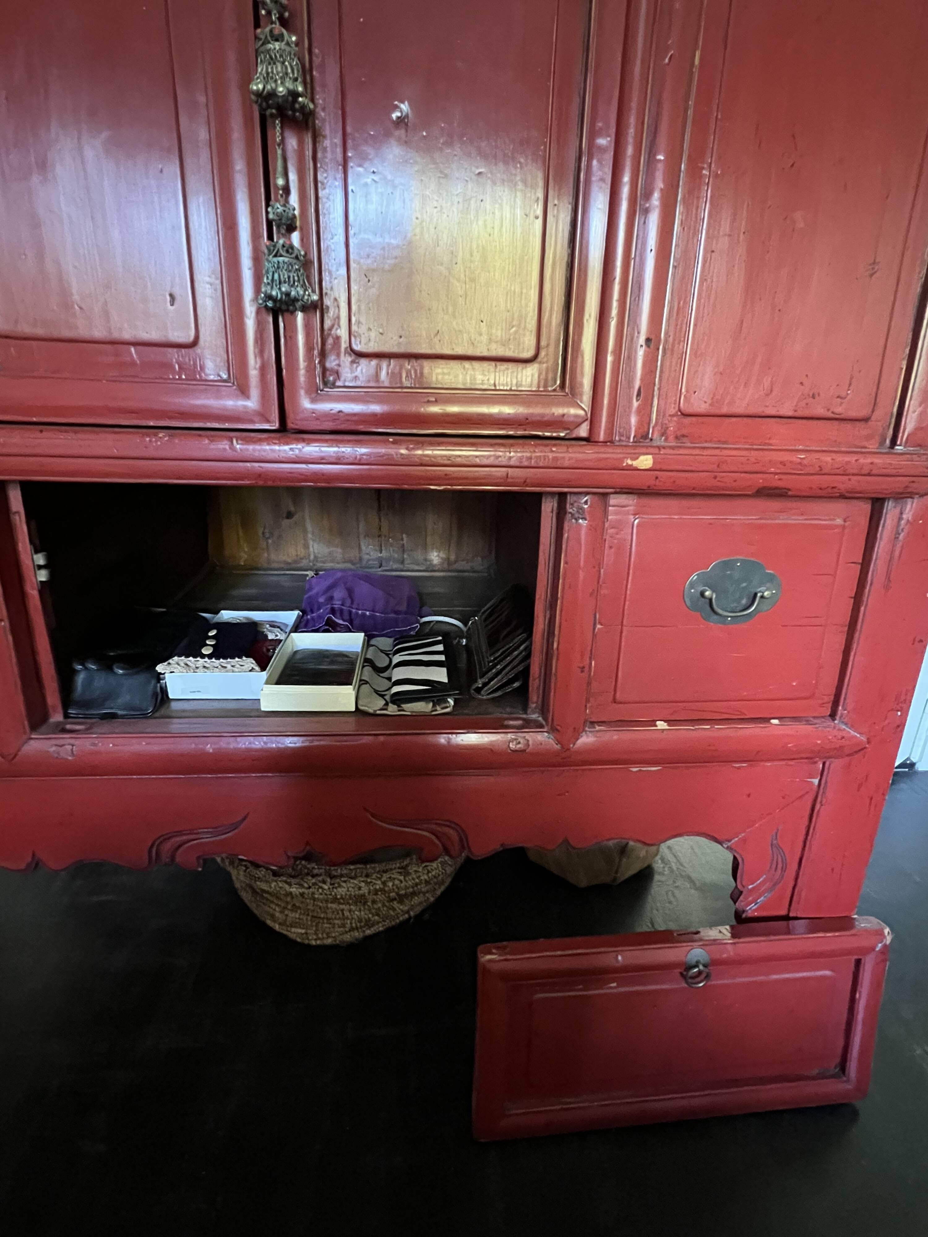 Red lacquered Chinese cabinet