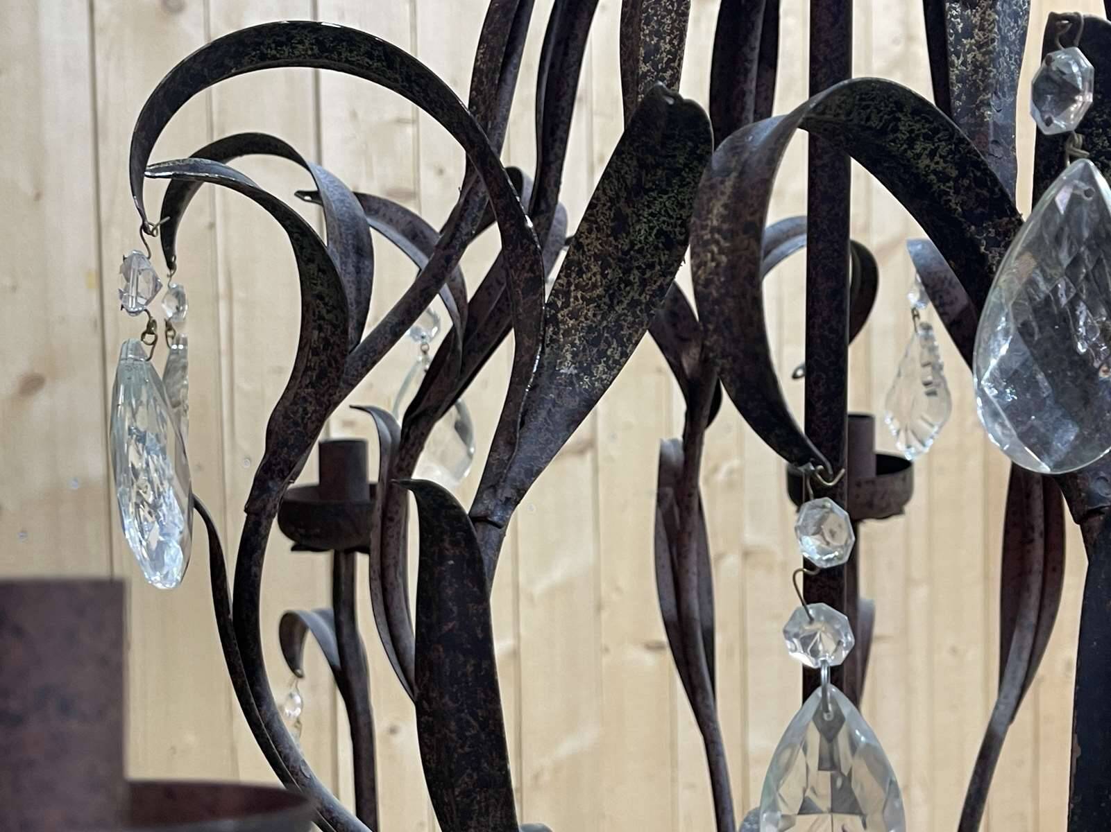 Large pineapple chandelier in blackened metal and tassels