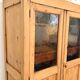 Glass-fronted cabinet in solid wood