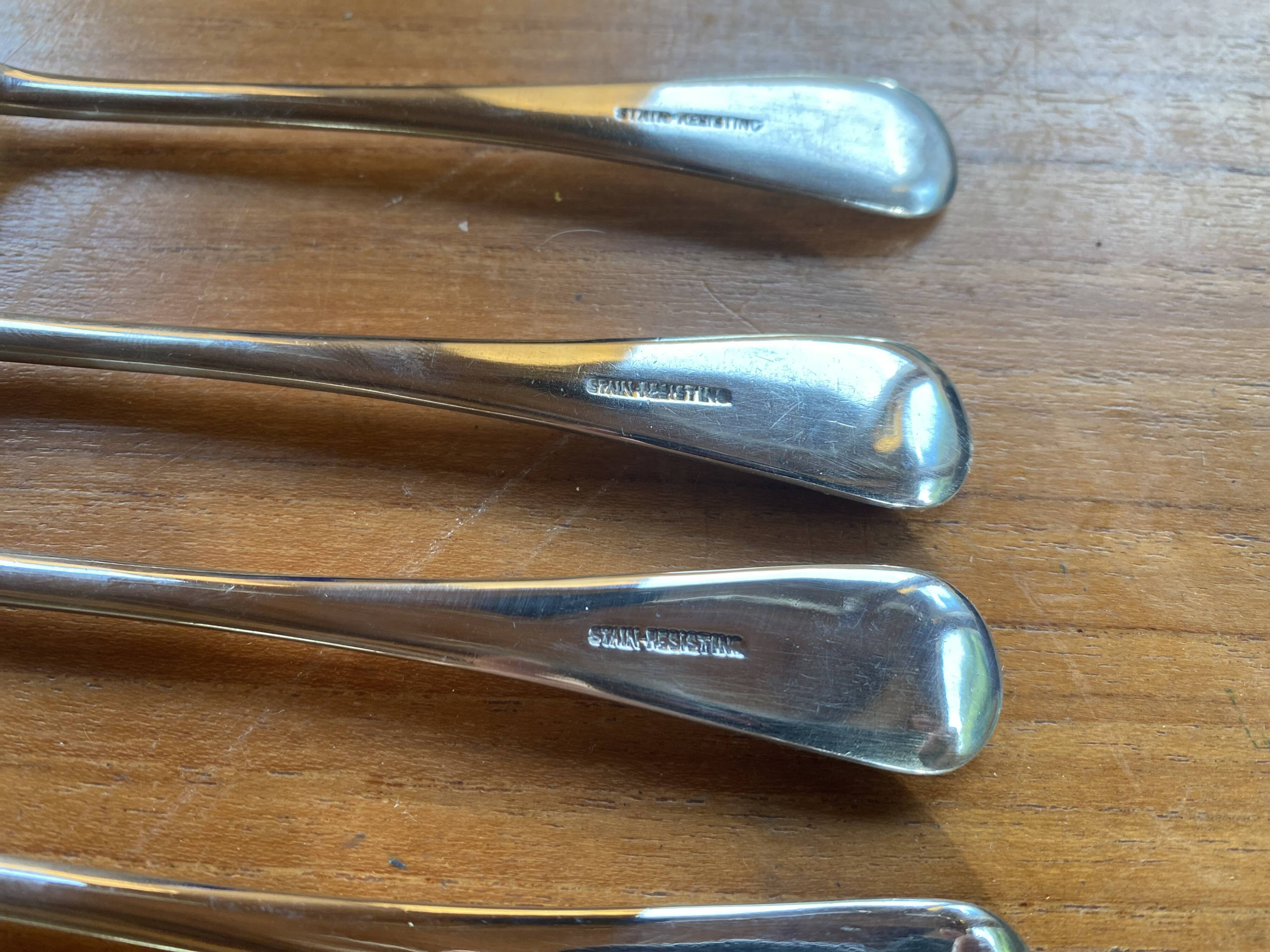 Set of 5 silver English forks