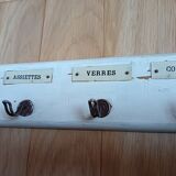 Kitchen towel holder. 5 hooks labeled for hands, plates