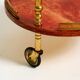 Round, small 1960s Aldo Tura serving or bar trolley in red goatskin leather