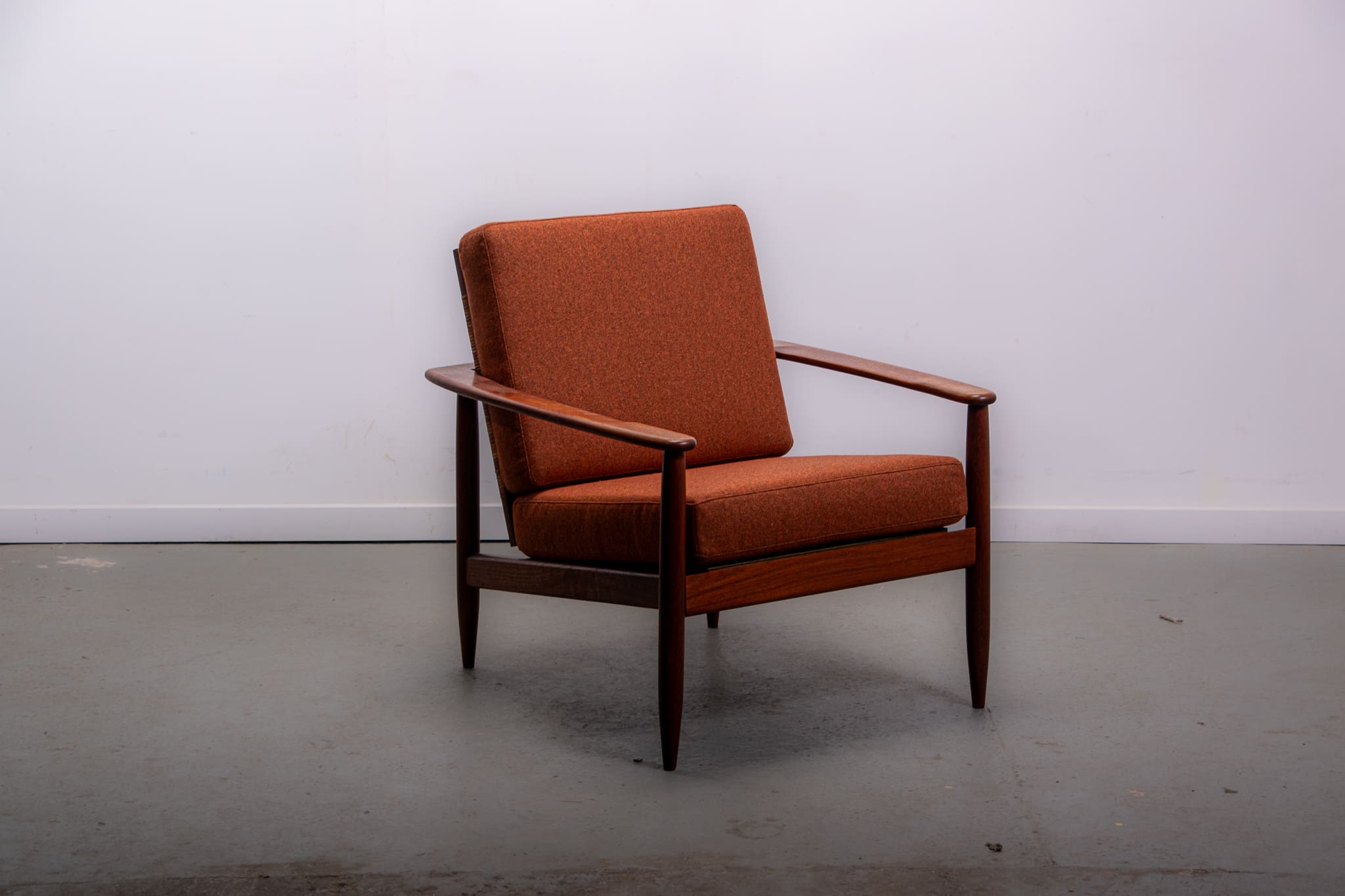 Mid-century easy chair in teak and cane circa 1970