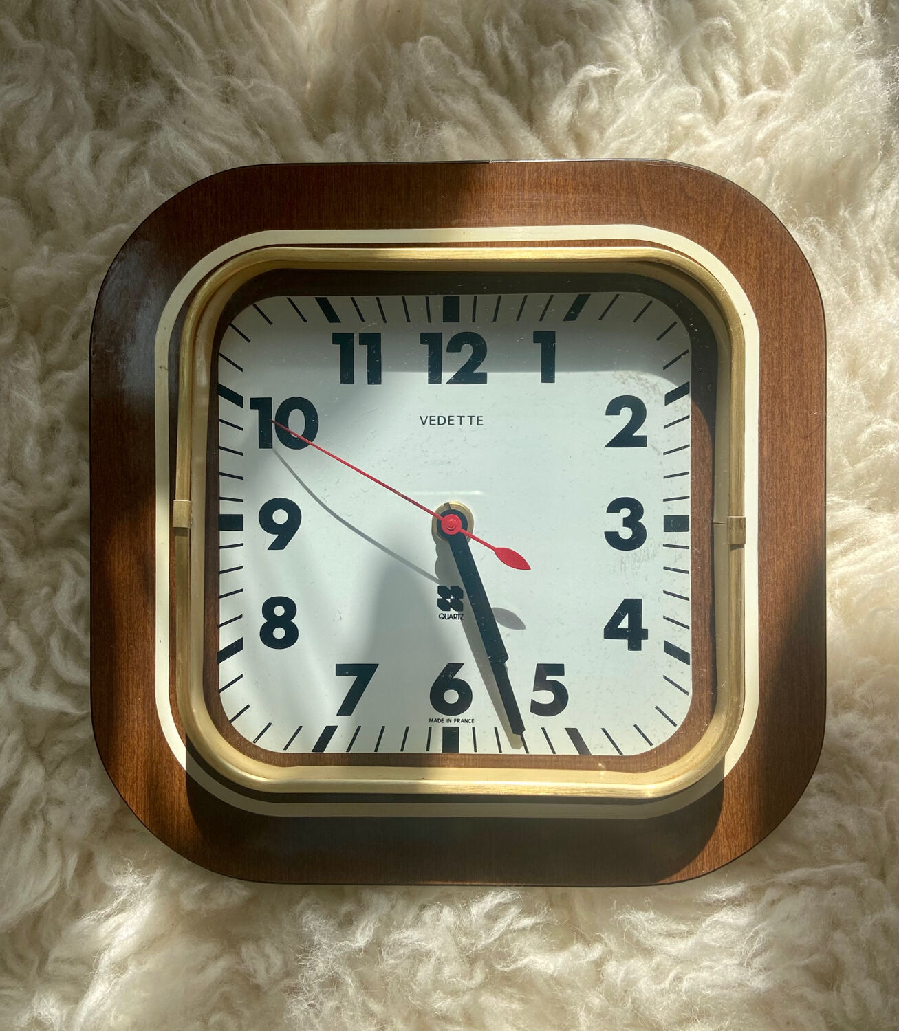 Wall clock in wood and glass 70s