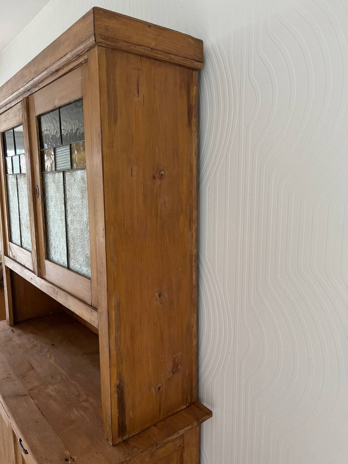 Antique dresser with glass doors and fleur-de-lys from the 50s