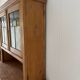Antique dresser with glass doors and fleur-de-lys from the 50s