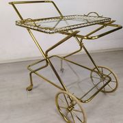 Vintage golden brass rolling service