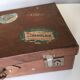 Suitcase of leather with labels of palaces