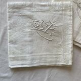Pair of hand-embroidered SR monogram pillowcases.