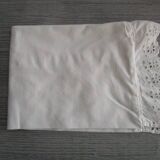 Antique embroidered half-moon crib pillowcase