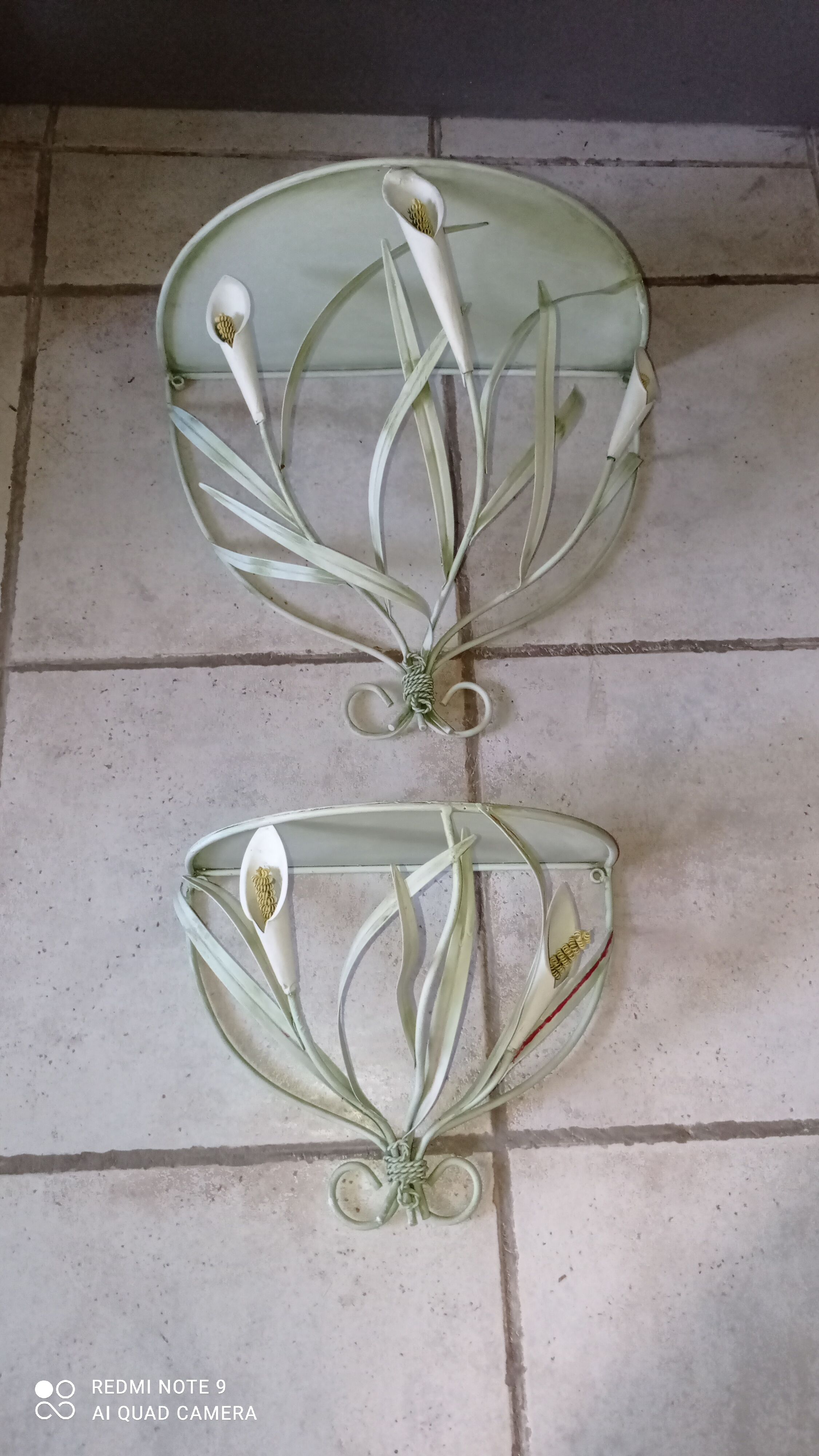 Duo of wrought iron shelves