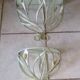 Duo of wrought iron shelves