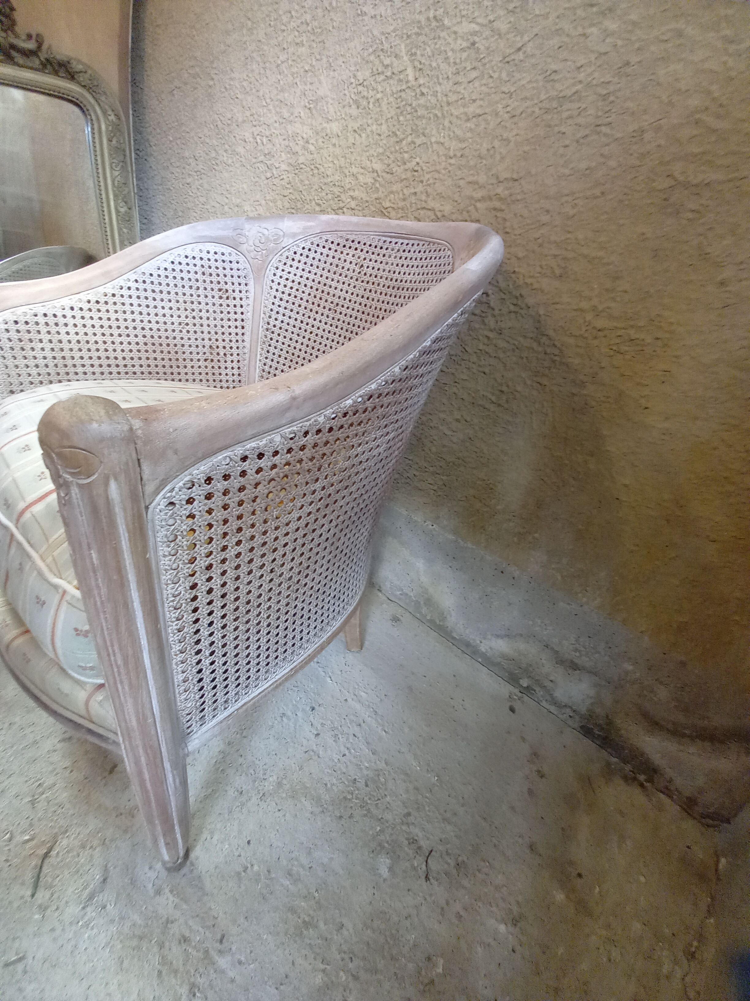 Canned basket armchair