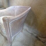 Canned basket armchair
