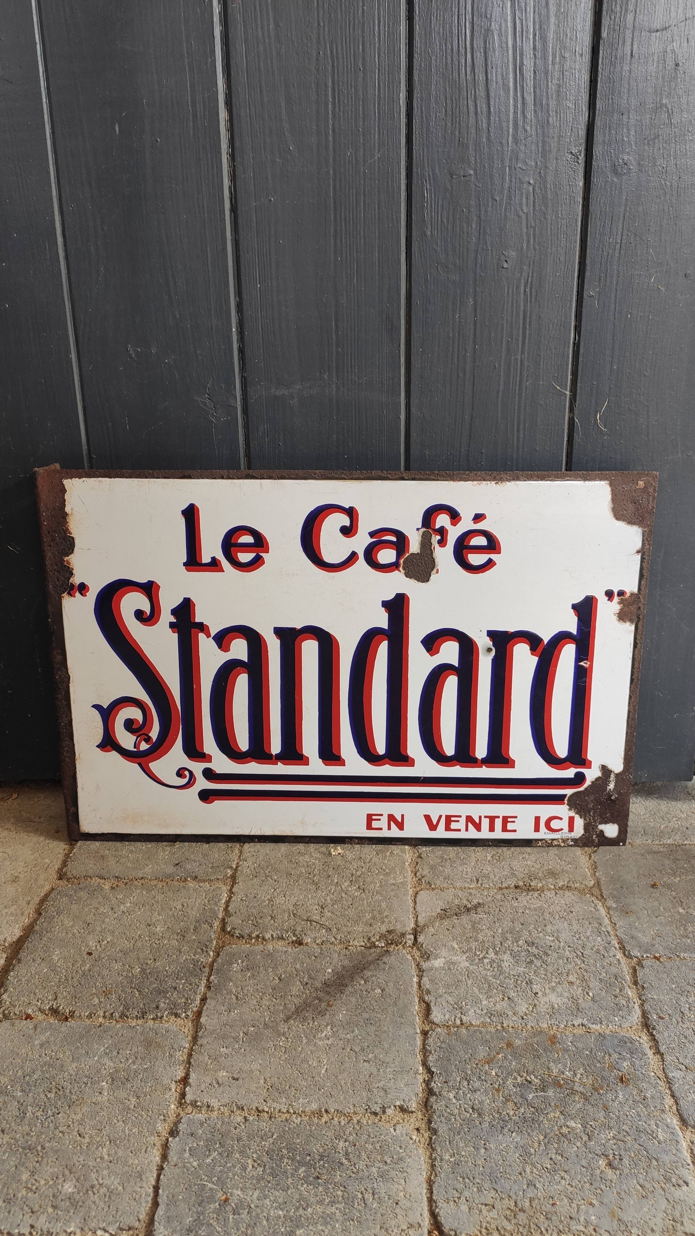 Old metal advertising plate