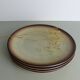 Set of 4 flat plates in speckled sandstone