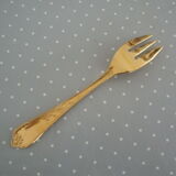 Golden metal cake forks