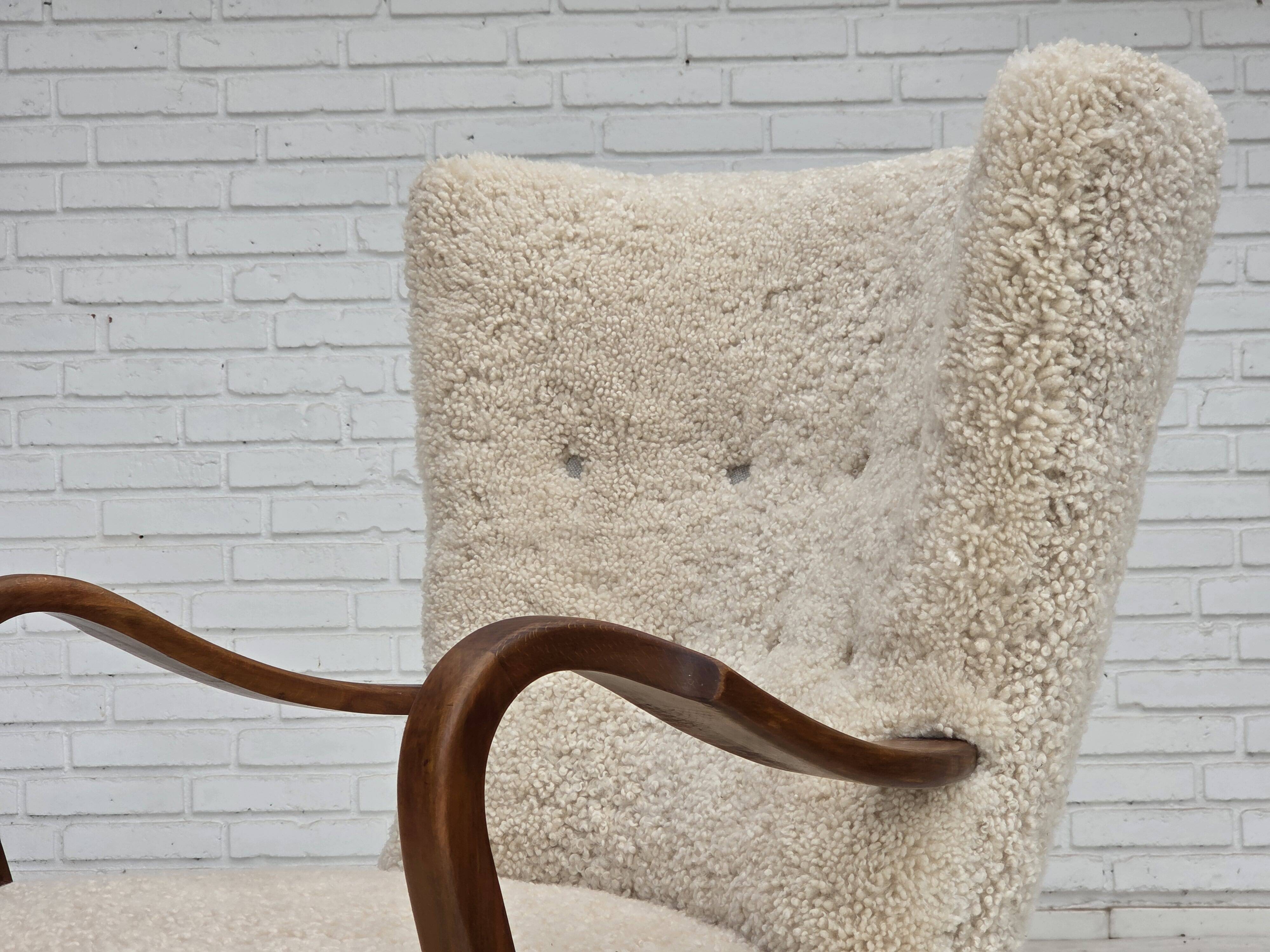 1960s, Danish design by Alfred Christensen, reupholstered, sheepskin.