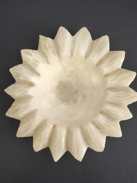 Alabaster pocket emptier or ashtray